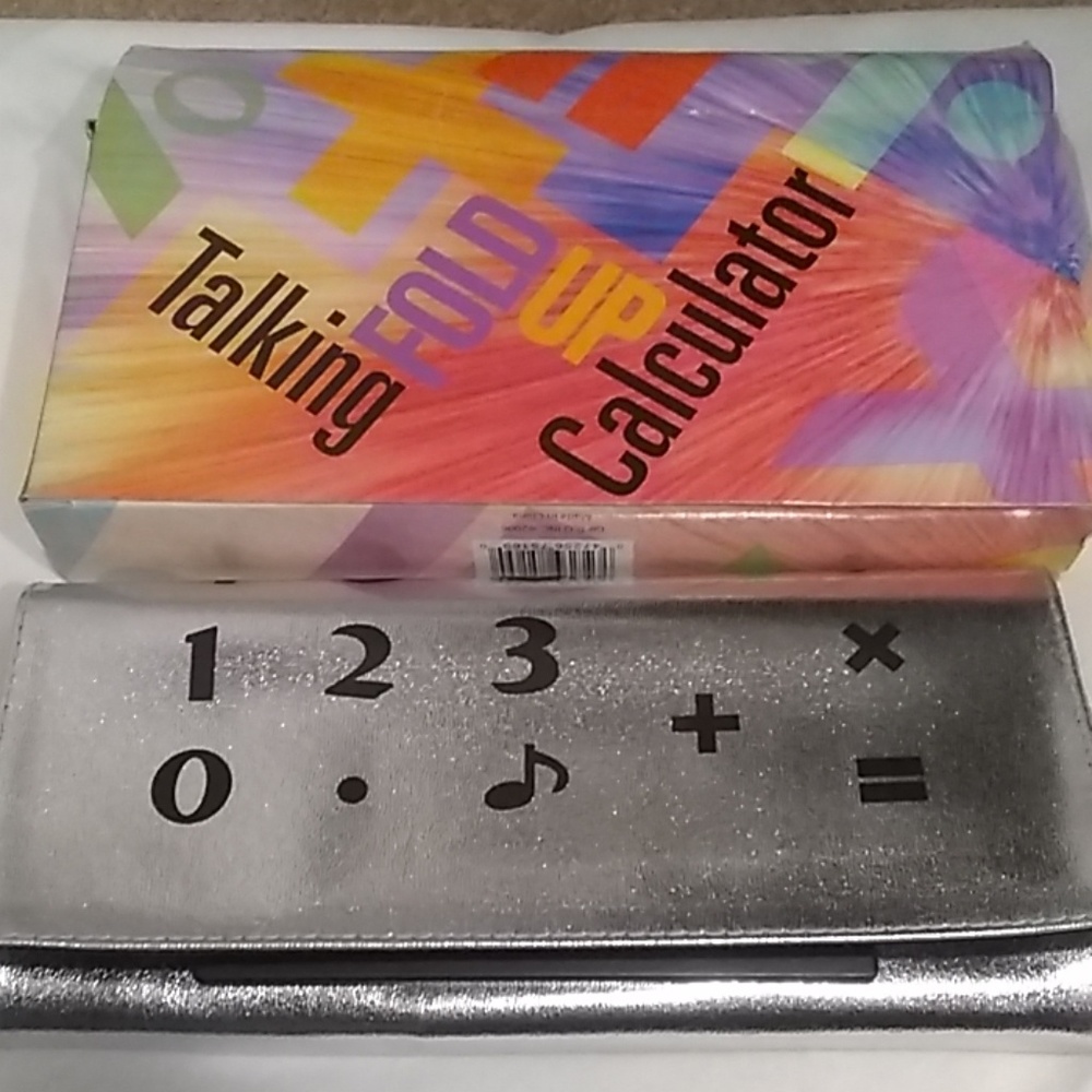 A talking fold-up calculator alarm clock